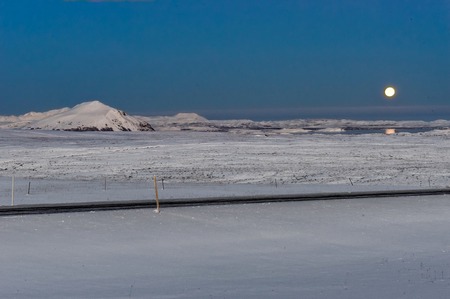 Moon over Iceland winter Landscape snow Whiteの写真素材
