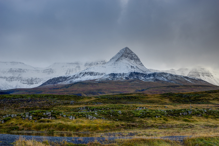 Mountain nature view Iceland during Sunset sky Clouds snow cappeの写真素材