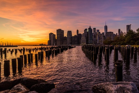 New York Skyline Cityscape Lower Manhatten World Trade Center Freedom Tower from Brooklyn Bridge Park Pierの写真素材