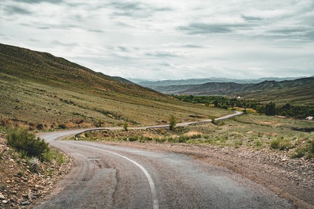 Highway street empty with green Kazakhstan Steppe viewの写真素材