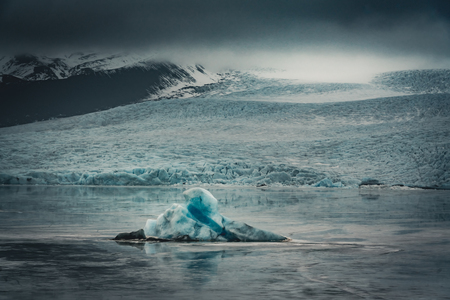 Fjallsarlon Jokulsarlon Huge glacier and mountains in Iceland Vatnajokull glacier aerial drone image with clouds and blue sky. Dramatic winter scene of Vatnajokull National Park, Iceland, Europe. Beauty of nature concept background.の写真素材