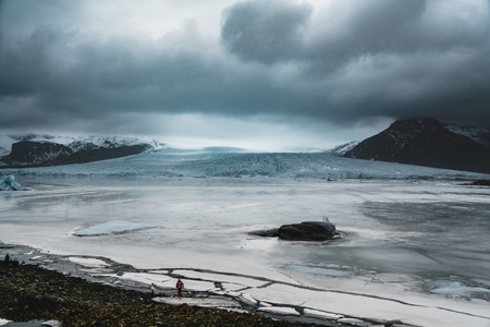 Fjallsarlon Jokulsarlon Huge glacier and mountains in Iceland Vatnajokull glacier aerial drone image with clouds and blue sky. Dramatic winter scene of Vatnajokull National Park, Iceland, Europe. Beauty of nature concept background.の写真素材