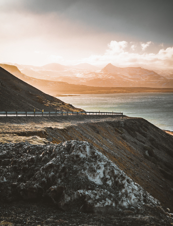 Street Highway Ring road No.1 in Snaefellsnes West Iceland, with view towards mountain. Western side if the country.の写真素材
