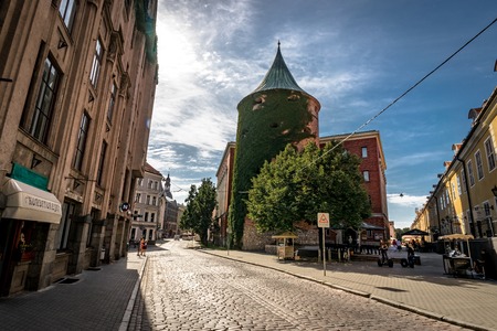 Riga, Latvia, August 2018 - Narrow medieval street in old Riga that is the capital and largest city of Latvia, a major commercial, cultural, historical and tourist center of the Baltic regionのeditorial素材