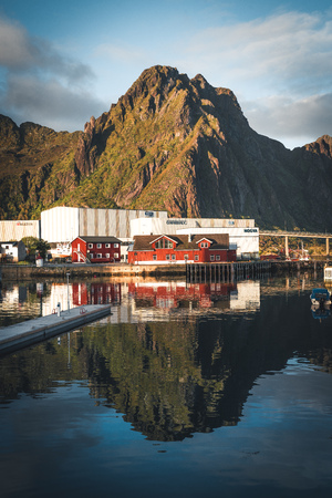 Svolvaer, Norway - September 2018: Boats in the waterfront harbor with mountains in the background. Svolvaer is a fishing village and tourist town located on Austvagoya in the Lofoten Islands.のeditorial素材