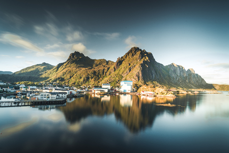 Svolvaer, Norway - September 2018: Boats in the waterfront harbor with mountains in the background. Svolvaer is a fishing village and tourist town located on Austvagoya in the Lofoten Islands.のeditorial素材