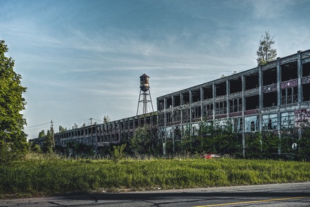 Detroit, Michigan, United States - October 2018: View of the abandoned Packard Automotive Plant in Detroit. The Packard Plant sprawls multiple city blocks and measures in at 3.5 million square feet. The plant opened in 1903 and closed in 1958 and sits abaのeditorial素材