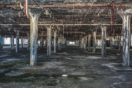 Detroit, Michigan, United States - October 18 2018: View of the abandoned Fisher Body Plant in Detroit. The Fisher Body Plant sprawls multiple city blocks and measures in at 3.5 million square feet. The plant opened in 1903 and closed in 1958 and sits abaのeditorial素材