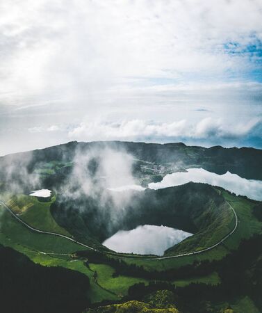 Landscape of Sete Cidades from Mirador da Boca do Inferno at sunset with lagoa de Santiago, Sao Miguel, Azores Islands, Portugalの写真素材