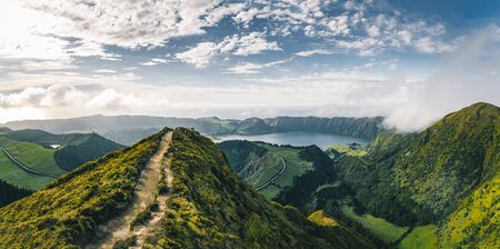 Landscape of Sete Cidades from Mirador da Boca do Inferno at sunset with lagoa de Santiago, Sao Miguel, Azores Islands, Portugalの写真素材