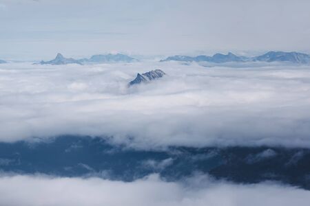 Sermitsiaq, the majestic mountain near the capital of Greenland, Nuuk peaking through the clouds....