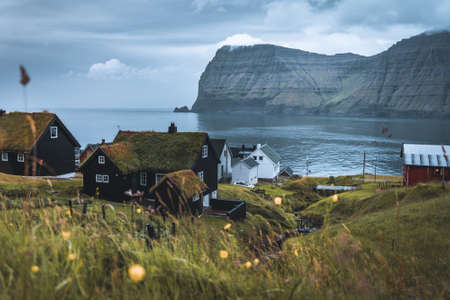 Village of Mikladalur located on the island of Kalsoy, Faroe Islands, Denmarkの写真素材