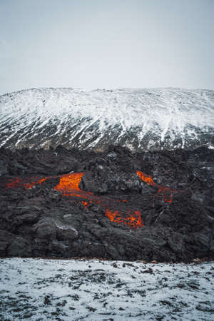 Iceland Volcanic eruption 2021. The volcano Fagradalsfjall is located in the valley Geldingadalir close to Grindavik and Reykjavik. Hot lava and magma coming out of the crater.の写真素材