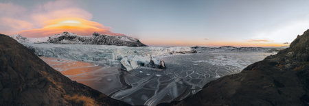 Aerial drone panorama top view glacier iceland svinafellsjoekull and Vatnakokull. Sunset with...