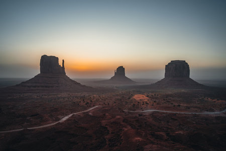 Panoramic view of Monument Valley USA Utah during Sunset and sunrise with famout view to the sisters and west mitten butteの写真素材
