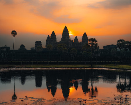 Angkor Wat in Cambodia during sunrise with palms.の写真素材