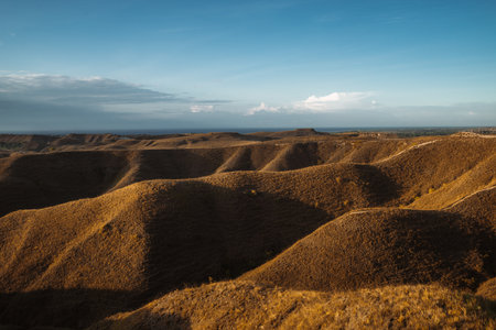 A beautiful view of indonesian paradise at Wairinding hills at Waingapu, East Sumba, East Nusa Tenggara, Indonesia.の写真素材