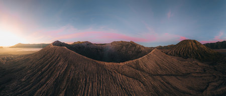 Aerial drone view of Bromo crater Mountain, East Java, Indonesia. man standing on the edge of Bromo crater, high contrast, Bromo Tengger Semeru National Parkの写真素材