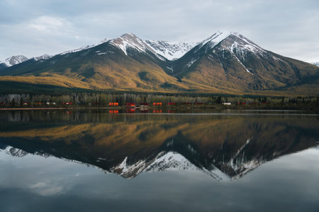 Mt rundle and vermillion lakes with colorful trains. Rocky mountains, banff, alberta, canadaの写真素材