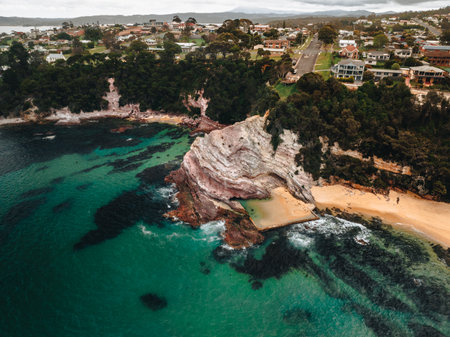 Aerial Drone Shot of Aslings Beach Rock Pool in Eden, New South Wales, Australia.の写真素材