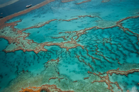 Aerial view of Great Barrier Reef coral reef structure in Whitsundays, Aerilie beach, Queensland, Australiaの写真素材