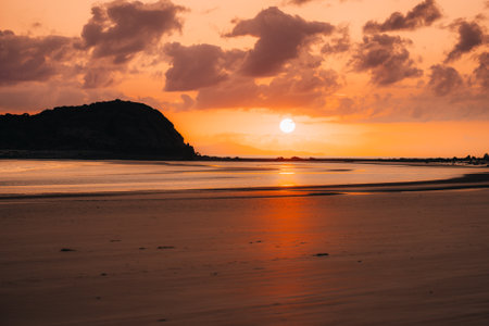 Colorful sunrise at the beach of Cape Hillsboroughの写真素材