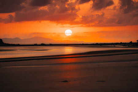 Colorful sunrise at the beach of Cape Hillsboroughの写真素材