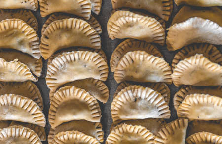 Rustical Ravioli or tortellini. High quality photoの写真素材