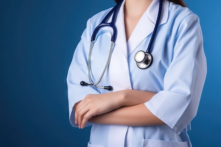 female doctorwith stethoscope over a blue backgroundの素材
