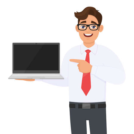 Happy young person showing laptop and pointing finger. Trendy business man carrying computer and gesturing hand. Male character holding digital technology device. Cartoon illustration in vector style.のイラスト素材