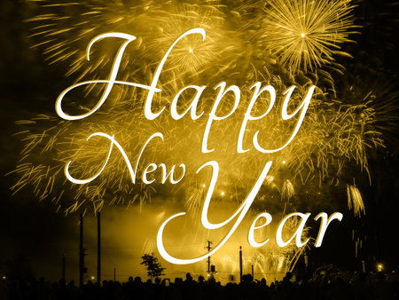 Happy new year card on a golden fireworks background