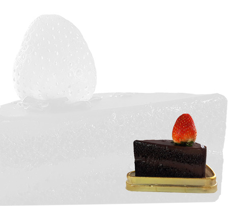 Chocolate cake and Strawberry placed on golden tray on white backgroundの写真素材