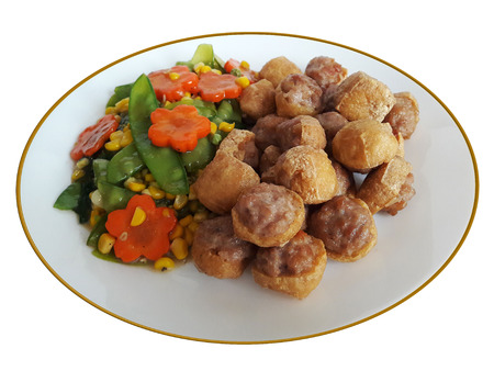 Fired tofu stuff with seasoning minced pork served with vegetable firedの写真素材