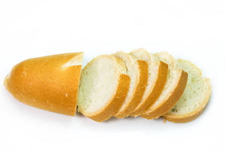 French baguette slices on white background