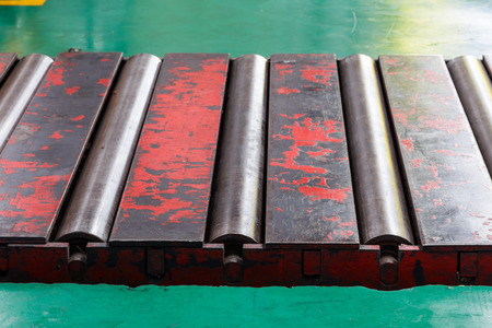 Close up heavy metal  rollers conveyor