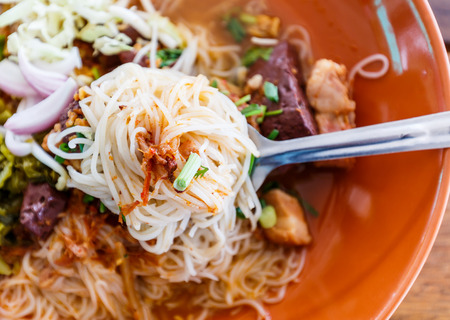 Close up noodle with spicy pork sup, traditional northern Thai foodの写真素材