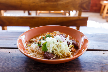 Noodle with spicy pork sup, traditional northern Thai foodの写真素材