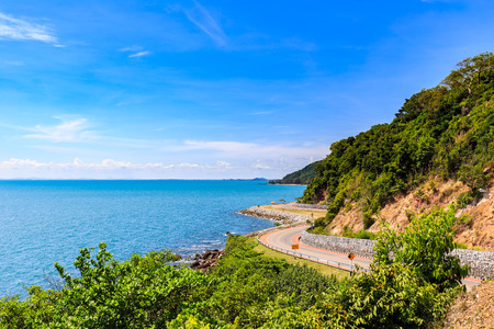 Curve road with sea view and blue sky at Khung Wiman Beach, Chantaburi Thailand.の写真素材