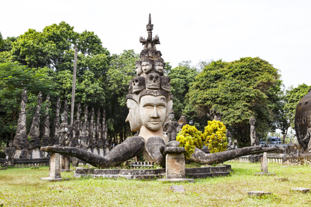 VIENTIANE ,LAOS - NIVEMBER 29:Hindu and Buddhist statue in Xieng Khuan temple buddha park , NOV 29,2013,  Vientiane Laos. Hindu and Buddhist statue in Xieng Khuan temple buddha parkのeditorial素材