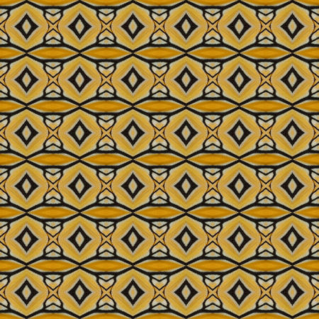 Yellow seamless pattern made from colorful butterfly wing for background textureの写真素材