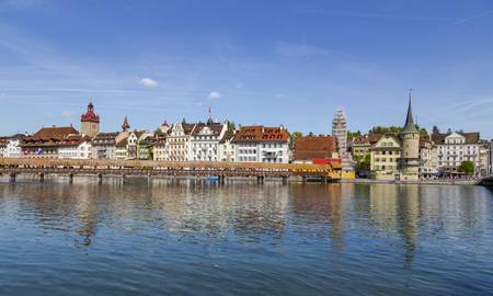 Chapel bridge famous place on lake Luzern with blue sky and vintage building in Luzern, Switzerland, Europe.の写真素材