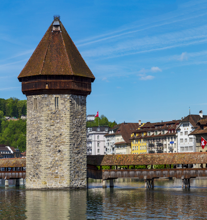 bridge famous place on lake Luzern with blue sky and vintage building in Luzern, Switzerland, Europe.の写真素材