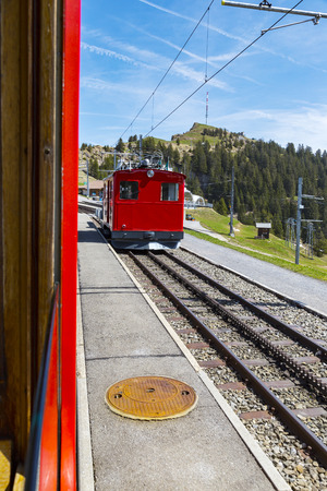Rigi bahn electric cable tram  on Rigi kulm, Alpine mountain, taken from bahnの写真素材