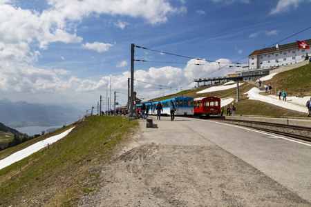 LUZERN, SWITZERLAND - APRIL 25:Rigi bahn electric cable tram  on Rigi kulm with traveler, APRIL 25,2018, Luzern, Switzerland. Rigi bahn electric cable tram  on Rigi kulm  Europe with traveler,のeditorial素材