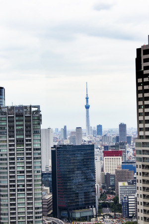 TOKYO ,JAPAN - OCTOBER 11: Tokyo skytree tower in Japan with road and building, OCT 11,2016, Tokyo, Japan. Tokyo skytree tower in Japanのeditorial素材