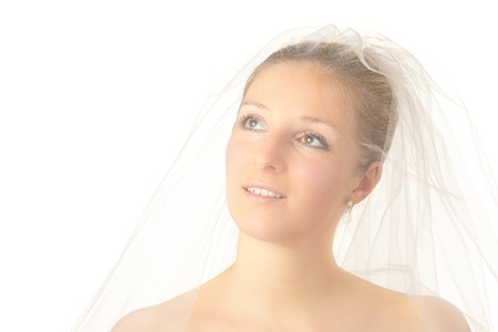 Young woman in wedding dress in studioの写真素材