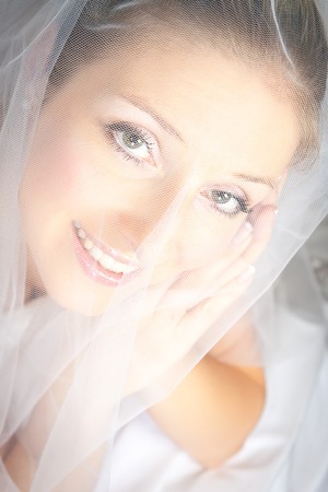 Bride woman in wedding dress in studioの写真素材