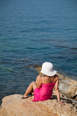 Natural caucasian woman tanning on exotic beachの写真素材