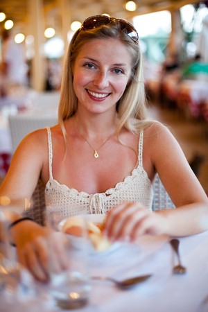Caucasian woman at restaurantの写真素材