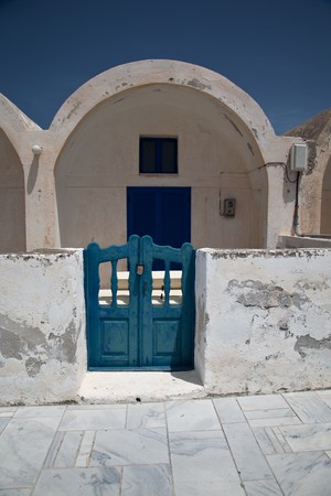 Santorini beautiful volcanic island in Greece landscape with blue churches, windmills and volcanic calderaの写真素材